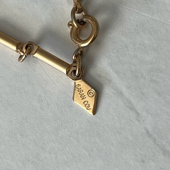 Vintage Sarah Coventry
Geometric Gold Burgundy and Black Pendant Necklace - Picture 3 of 4